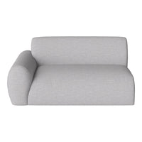 Light gray sectional sofa with a smooth, textured fabric and minimalist design, ideal for modern interiors.