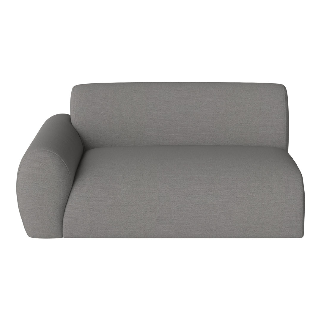 Stylish gray upholstered sofa with a smooth, textured finish, featuring a minimalist design and soft curves.