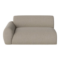 Beige sofa with subtle striped pattern and rounded armrest, perfect for modern interiors.