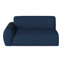 Deep navy blue sofa with smooth, textured fabric and a minimalist design, perfect for modern decor.