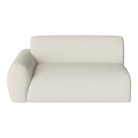 Cream-colored modern sofa with a minimalist design and textured fabric, perfect for contemporary interiors.