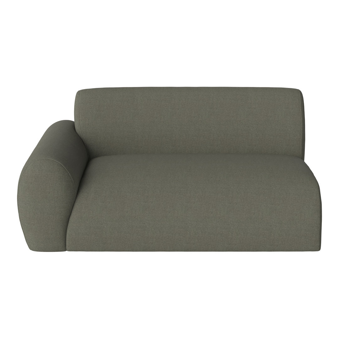 Modern sofa in muted olive green fabric with a smooth, minimalist design and soft rounded armrest.