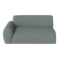 Sleek, modern couch in a soft, muted green fabric with a smooth, minimalist design.