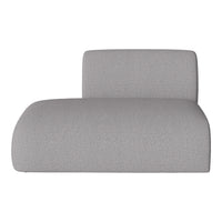 Gray upholstered chaise lounge with a textured fabric, perfect for modern interiors.