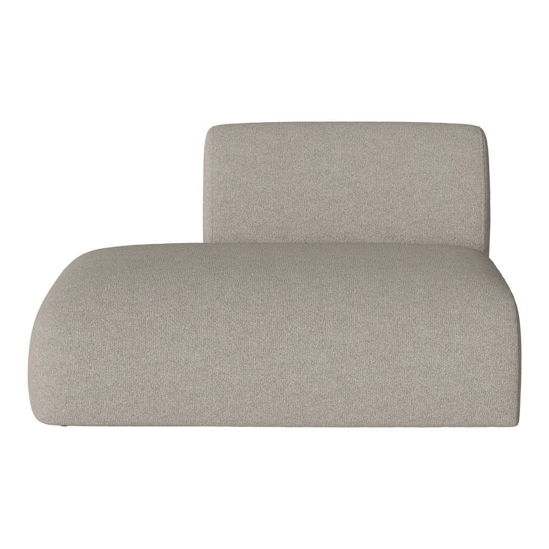 Beige upholstered chaise lounge with a sleek, modern design and subtle textured pattern. Ideal for contemporary decor.