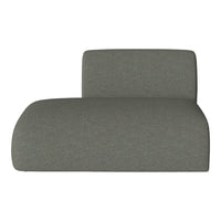 Sleek lounge chair in soft, muted green fabric with a smooth texture, perfect for modern decor.