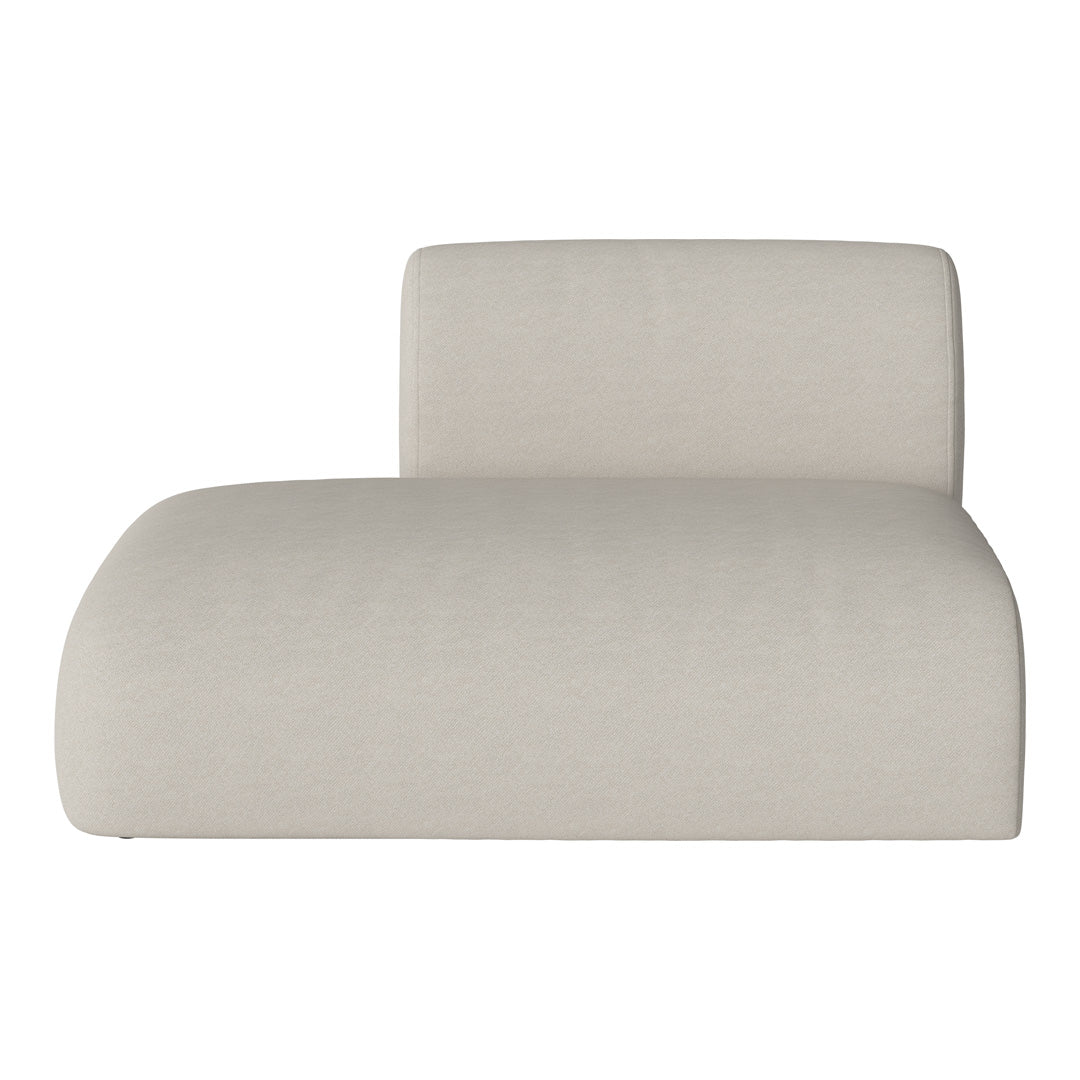 Simple beige chaise lounge with a smooth, textured fabric and minimalist design, perfect for modern decor.
