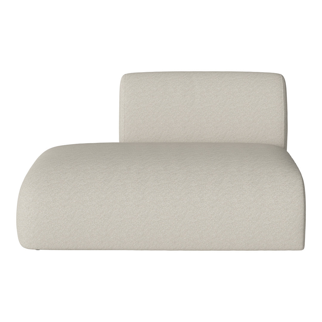 Light beige chaise lounge with subtle textured pattern, perfect for modern, neutral-toned interiors.