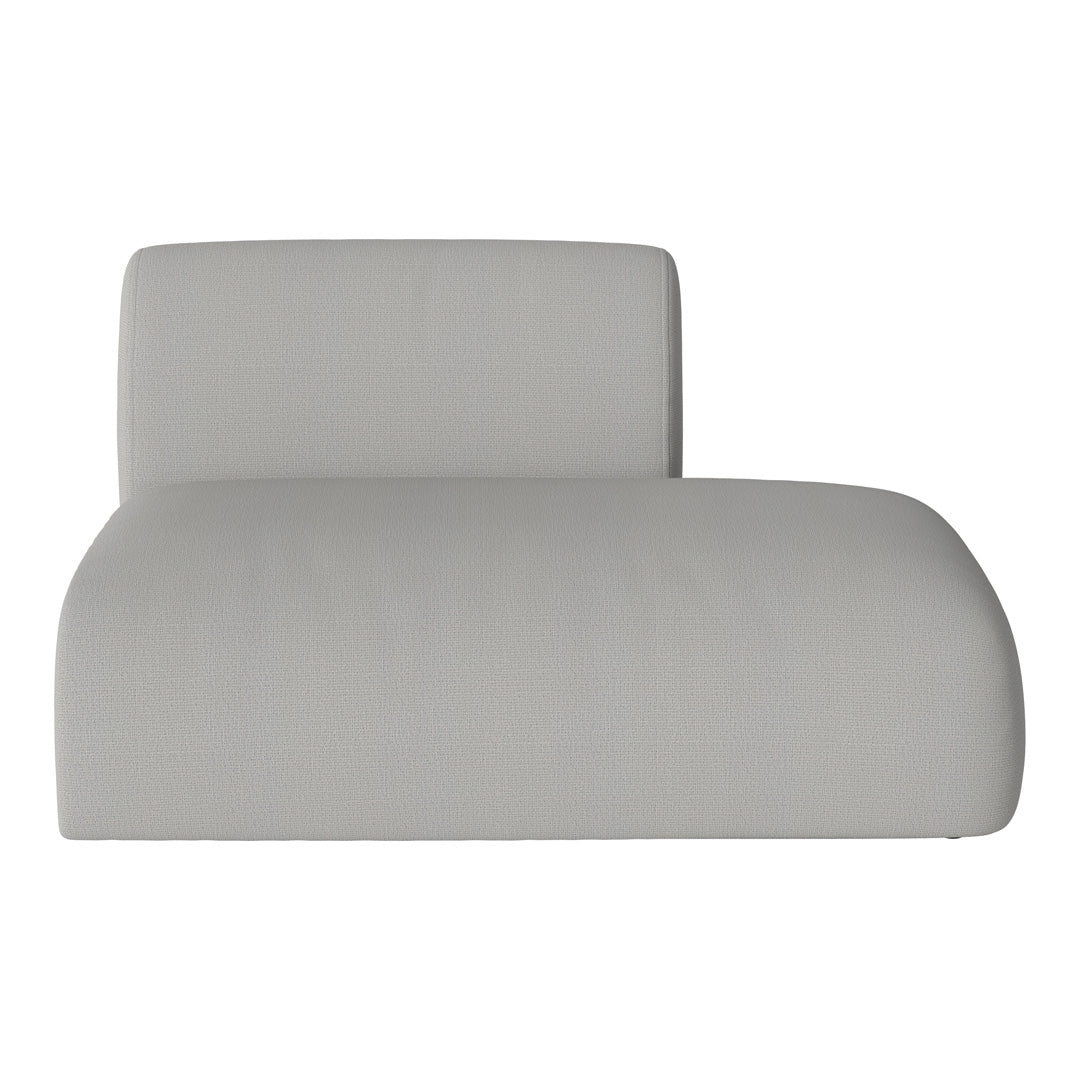 Light grey textured lounge chair with smooth, minimalist design. Perfect for modern interiors.