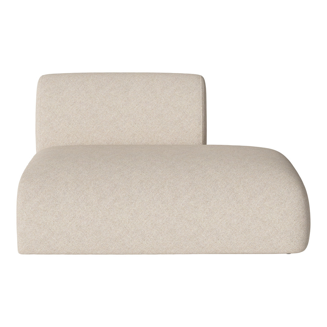 Beige upholstered chaise lounge with a soft texture and minimalistic design. Perfect for modern interiors.