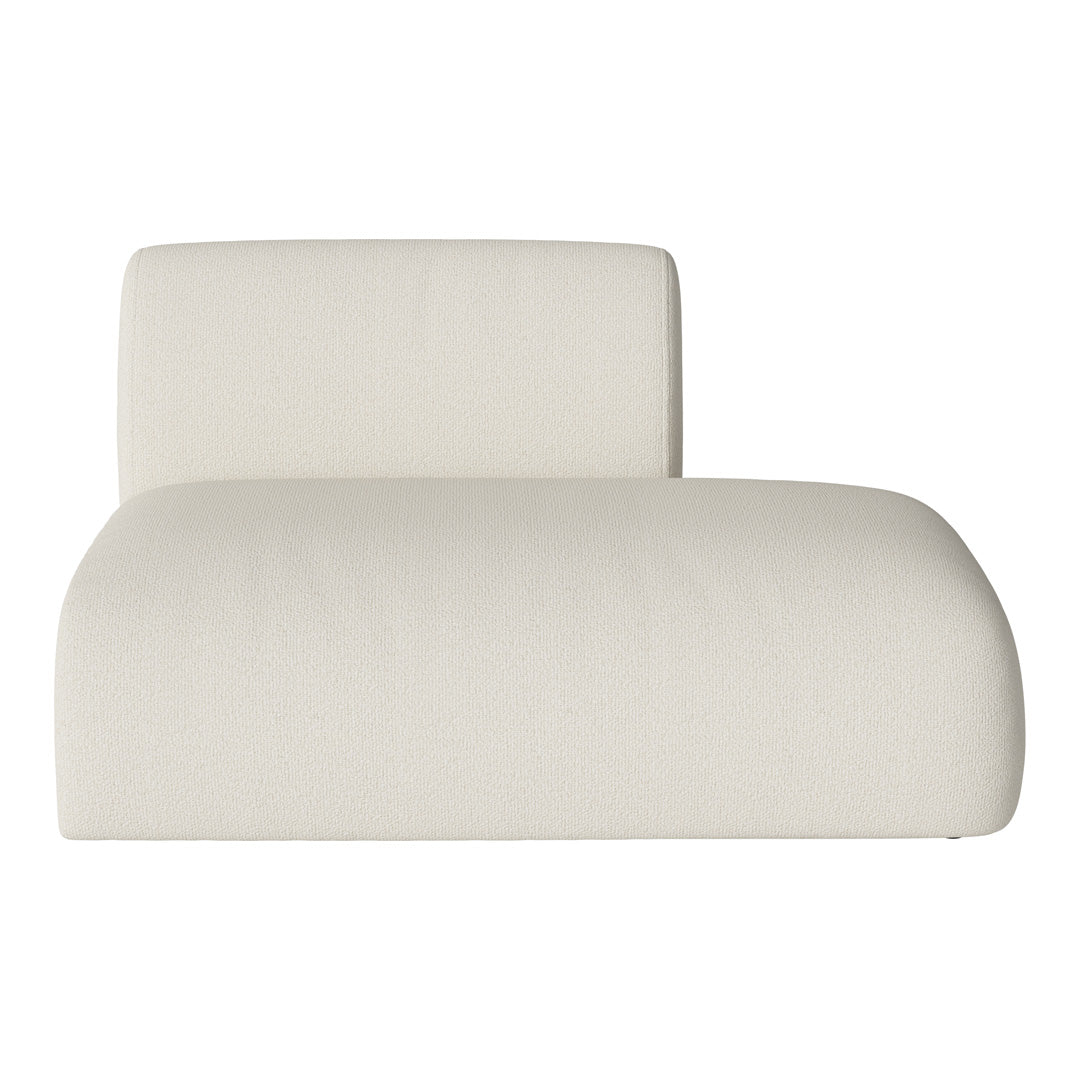 Cream-colored chaise lounge with a soft texture and minimalist design. Perfect for modern interiors.