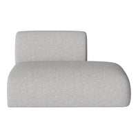 Soft light gray chaise lounge with a subtle textured pattern. Elegant and modern design for any space.