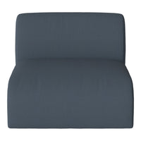 Textured dark blue couch with a subtle pattern for modern interiors.