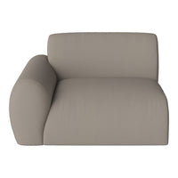 Beige modular sofa with a textured fabric and soft, rounded armrest design for modern living spaces.