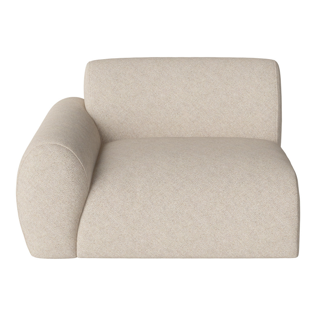 Beige textured lounge chair with soft curves and a minimalist design. Perfect for modern interior decor.