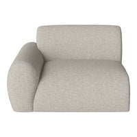 Light beige sofa with a subtle textured pattern and rounded armrest, perfect for modern living spaces.
