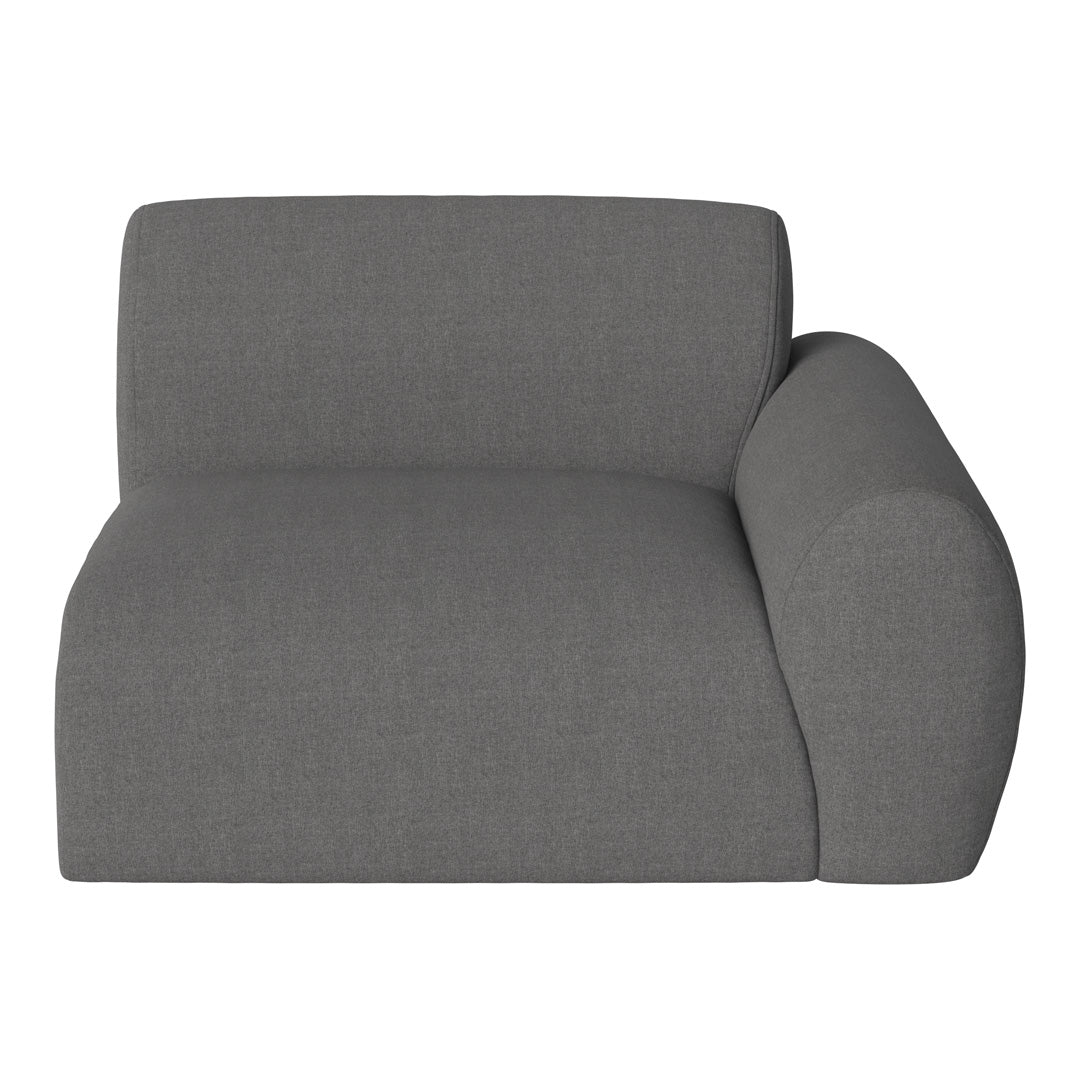 Gray upholstered armchair with a smooth, minimalist texture and rounded armrest. Ideal for modern decor.