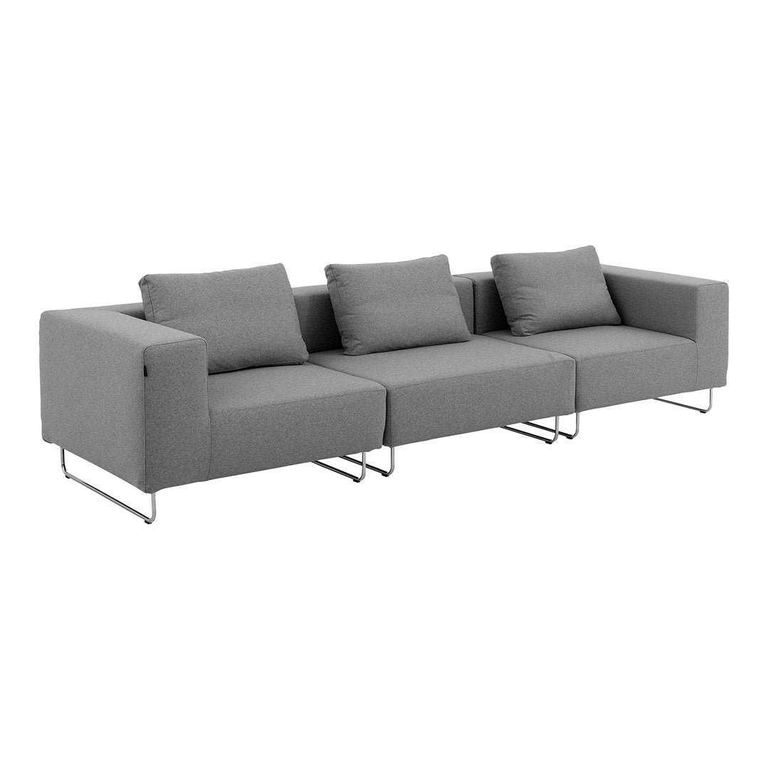Gray modular sofa with clean lines and subtle texture, featuring three cushions and a minimalist design.