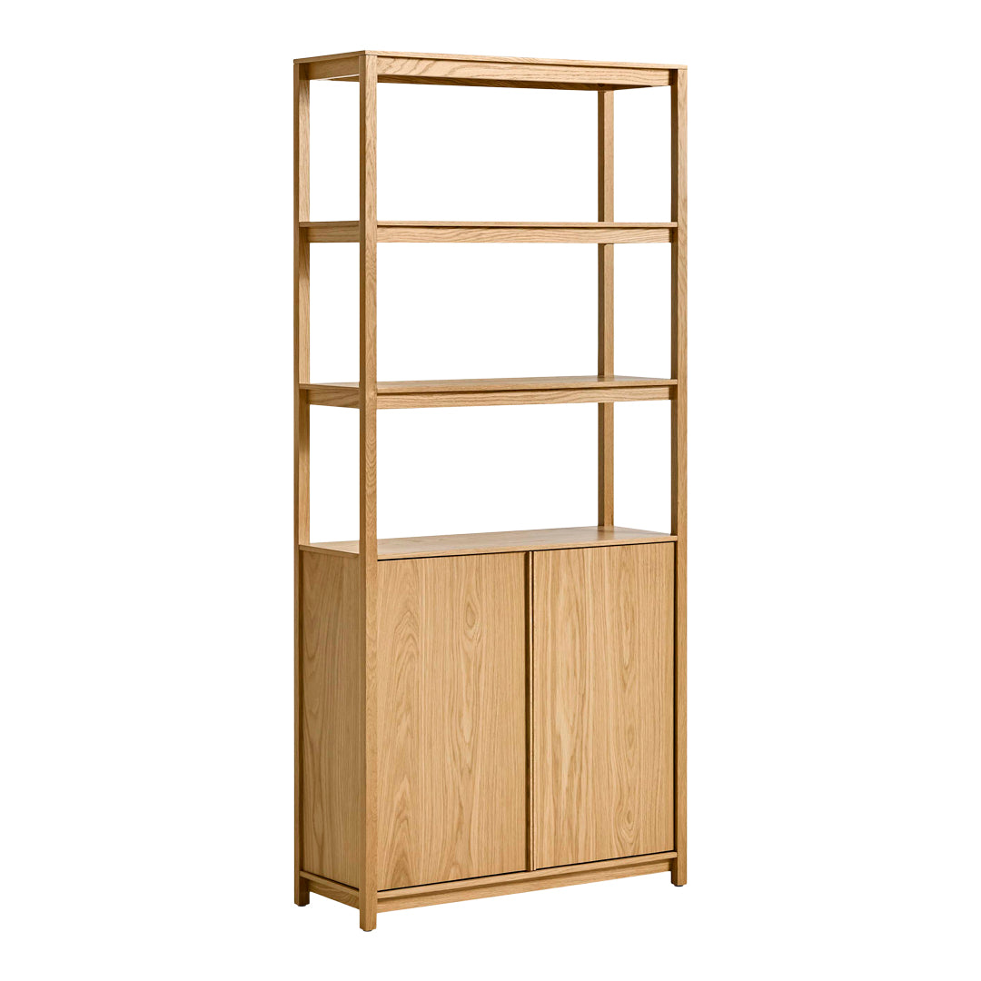 Light oak bookshelf with a minimalistic design, featuring open shelves and two closed cabinets. Simple and elegant finish.