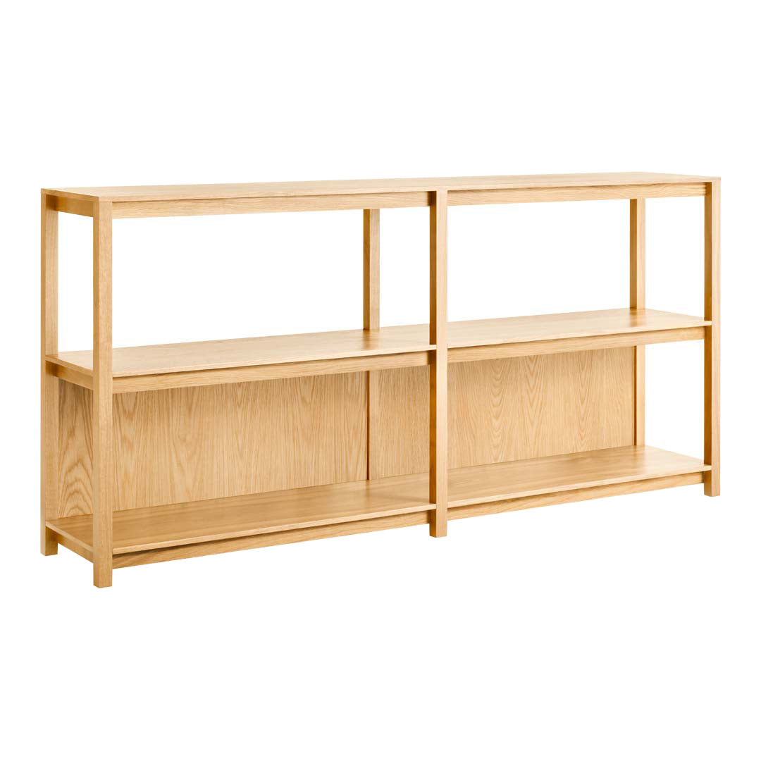 Light oak wood shelf unit with a natural finish and minimalist design, featuring open shelves and no visible patterns.