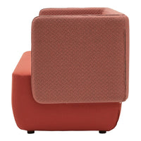 Modern two-tone sofa in coral orange with a textured diamond pattern, perfect for contemporary interiors.