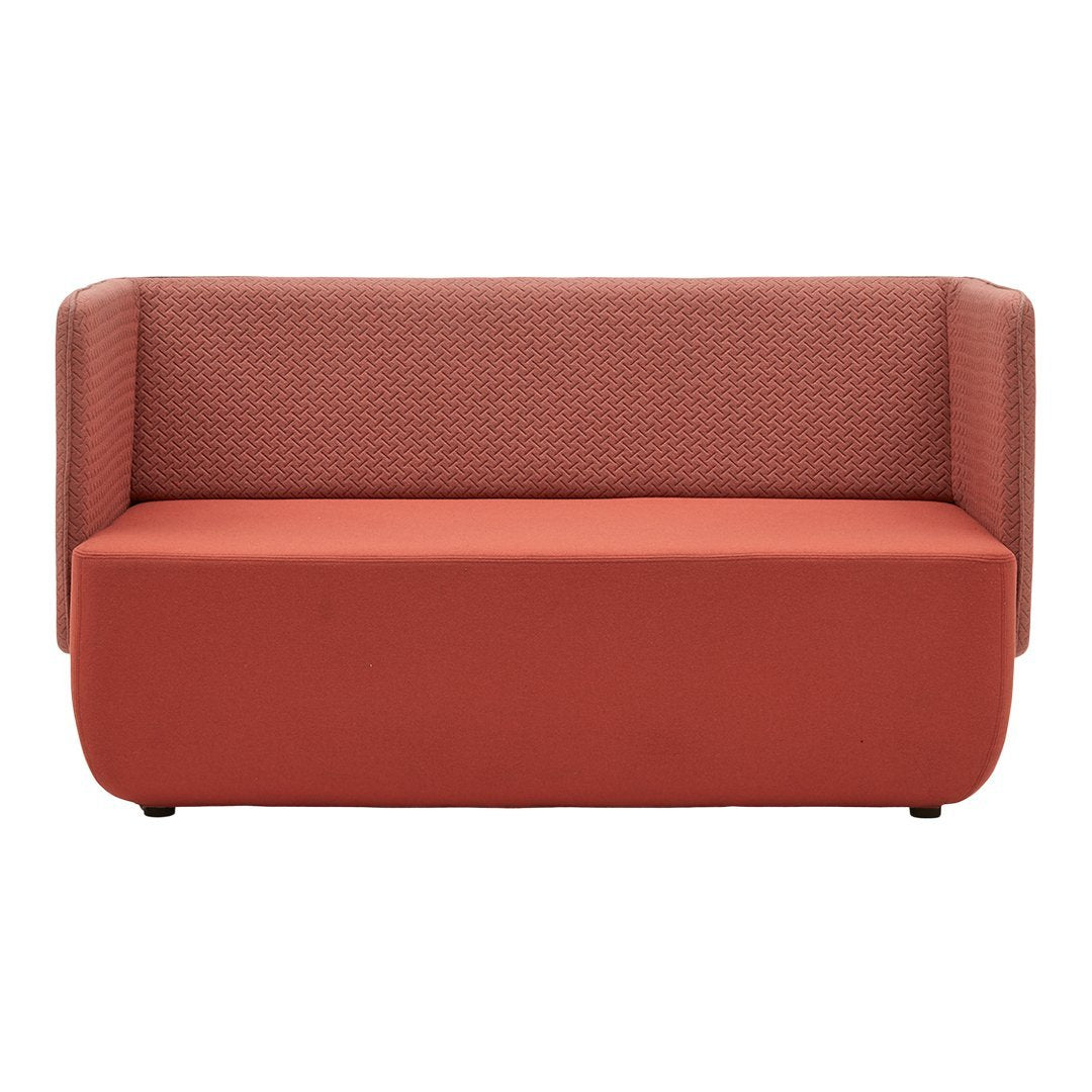 Textured coral two-seater sofa with a solid bottom and patterned backrest, ideal for modern decor.