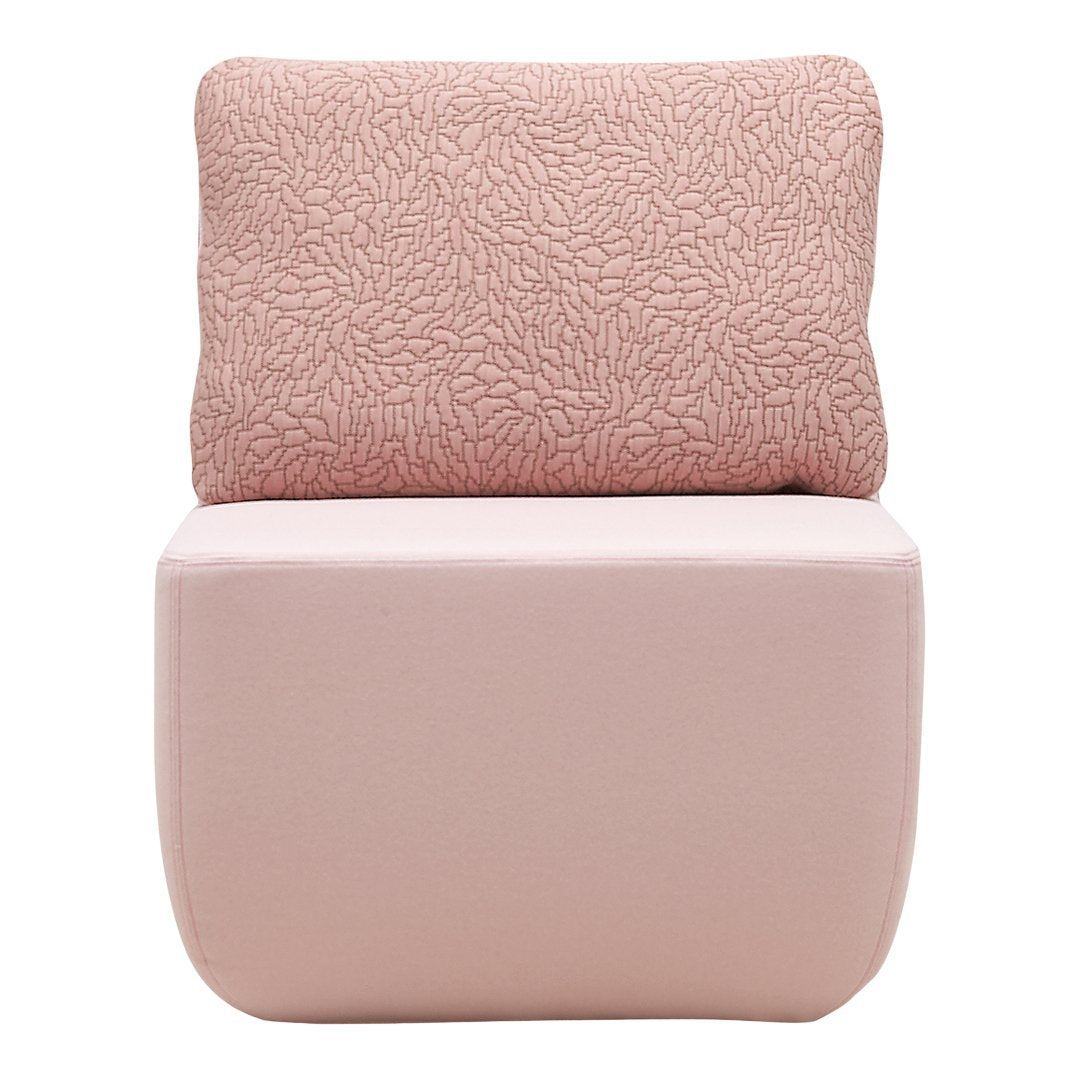 Soft pink chair with textured cushion showcasing a subtle pattern, perfect for modern decor. Ideal for cozy spaces.