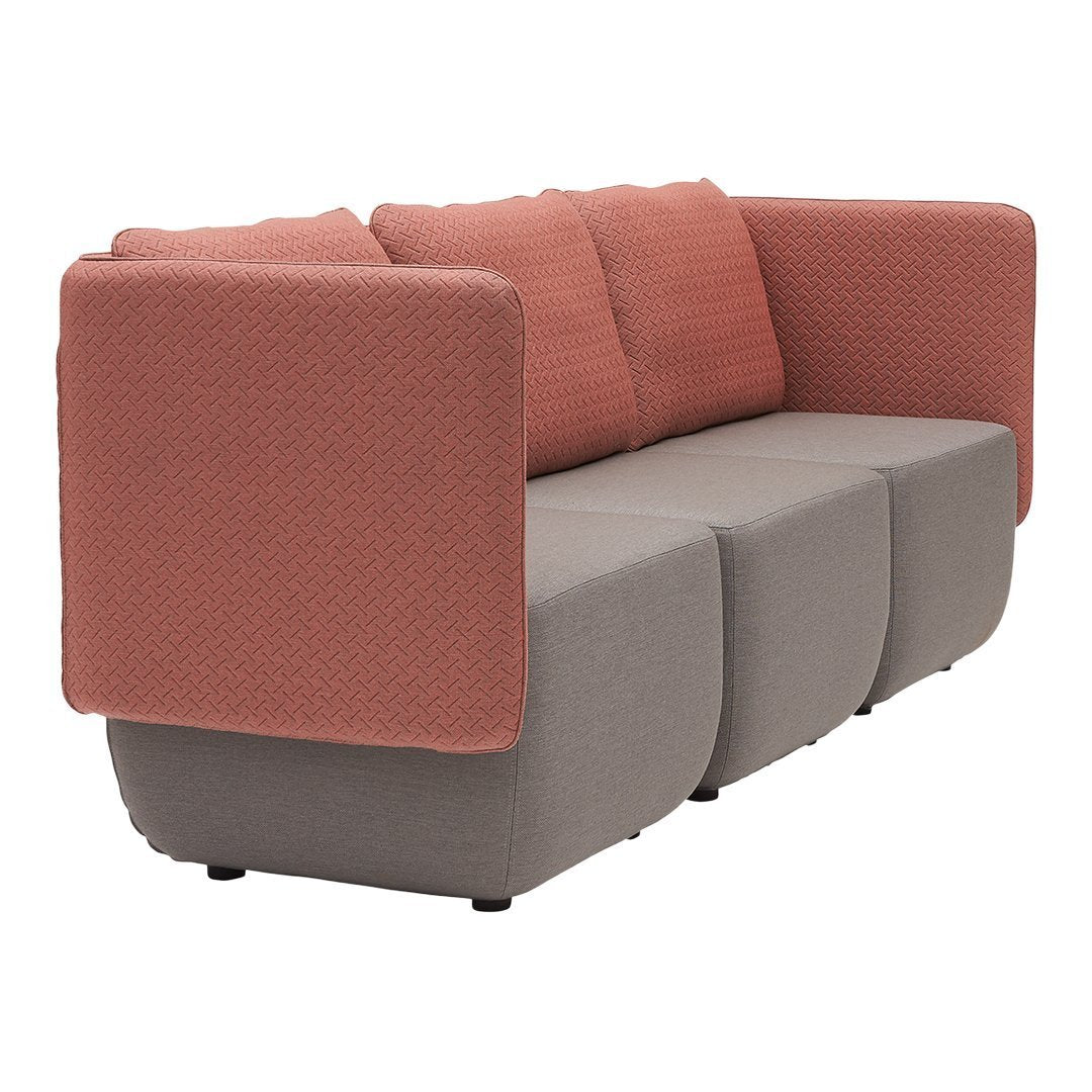 Stylish sofa featuring a textured coral back and smooth gray base, adding modern charm to any living space.