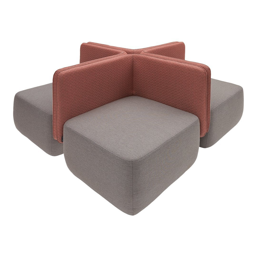 Modern geometric couch with soft gray and rust-colored fabric, featuring clean lines and minimalistic design.