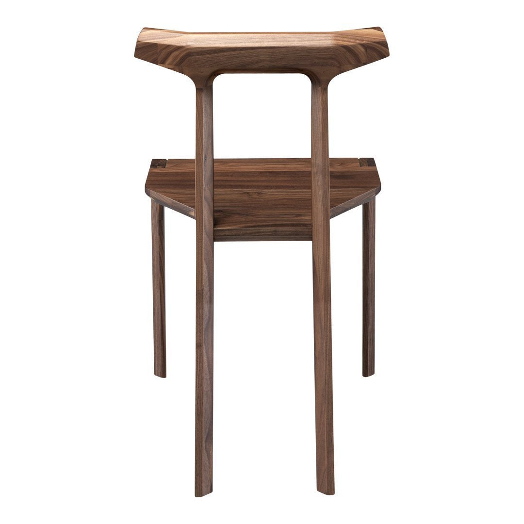 "Wooden stool featuring a rich walnut finish with smooth curves and a minimalistic design."