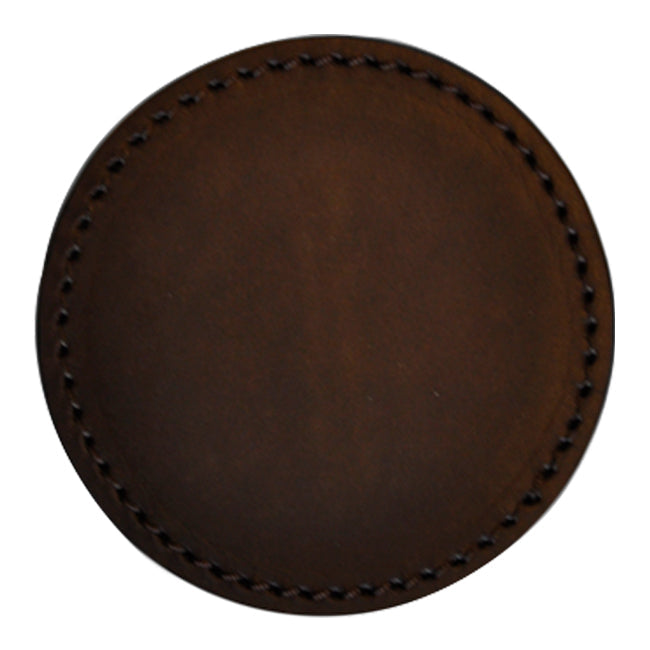 Round brown leather coaster with a smooth surface and intricate stitched border pattern. Ideal for home decor.