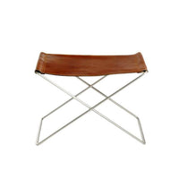 Brown leather stool with a sleek silver frame and minimalist design, adding a modern touch to any space.