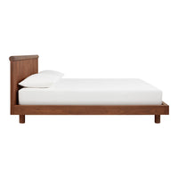 "Simple wooden bed frame in rich brown with a clean white mattress, showcasing minimalist design."