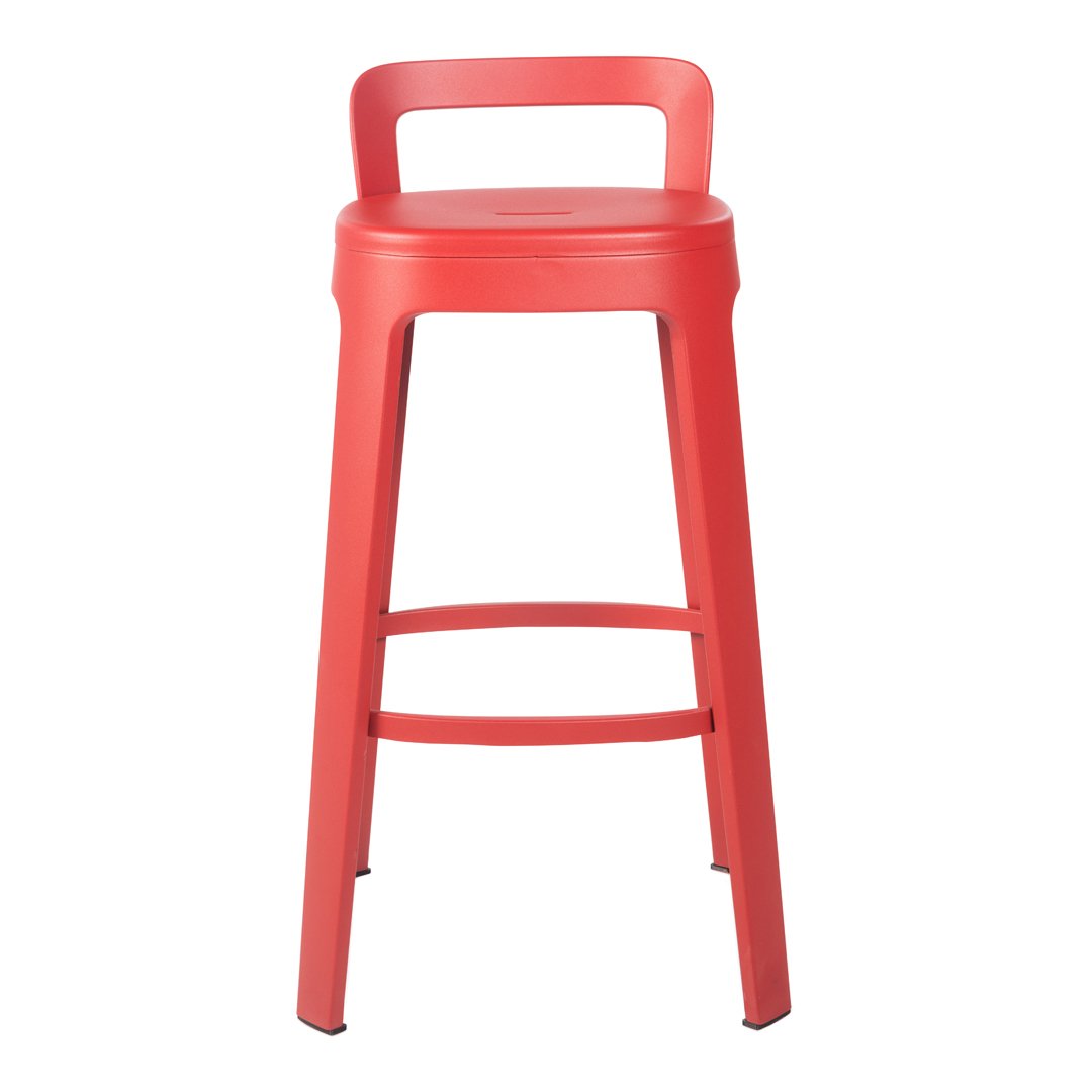 Red metal bar stool with clean lines and a minimalist design. Perfect for modern or industrial decor.