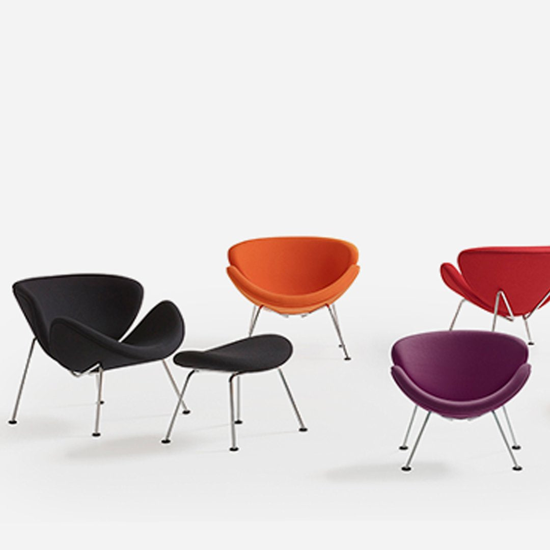Colorful modern chairs in black, orange, red, and purple with sleek metal legs and curved designs. Perfect for any space.