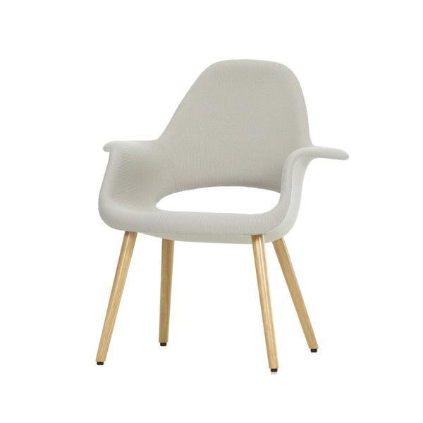 Light beige textured chair with wooden legs, featuring a modern, minimalist design. Perfect for contemporary spaces.