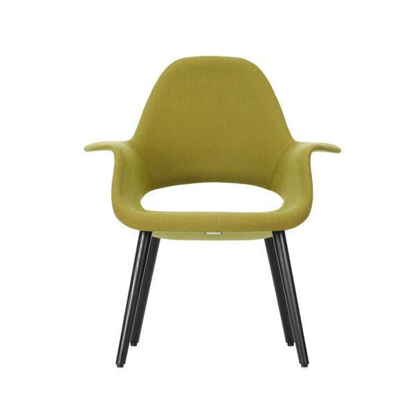 Olive green armchair with smooth upholstery and black wooden legs, featuring a minimalist and modern design.