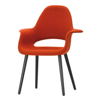 Vibrant orange armchair with a sleek black base, featuring a minimalist design and smooth fabric finish.