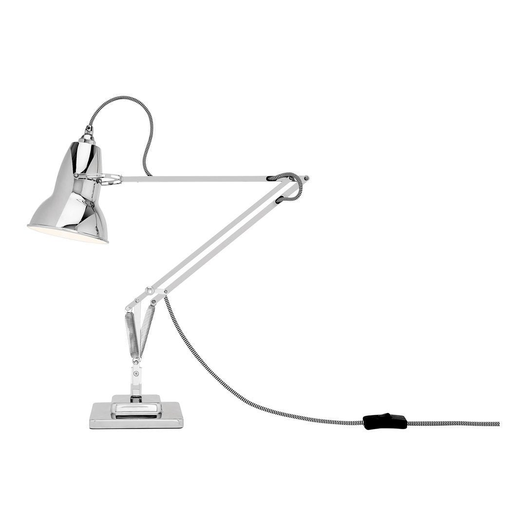 Sleek chrome desk lamp with a polished finish and minimalistic design, featuring clean lines and an articulated arm.