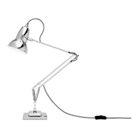 Sleek chrome desk lamp with a polished finish and clean geometric lines, perfect for modern spaces.