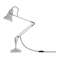 Gray adjustable desk lamp with silver accents and a sleek modern design. Perfect for stylish office lighting.