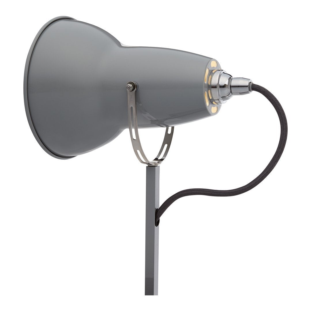 Stylish gray lamp with a sleek metallic finish and black cord, featuring a modern minimalist design. Perfect for any decor.