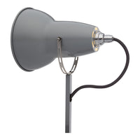 Stylish gray lamp with a sleek metallic finish and black cord, featuring a modern minimalist design. Perfect for any decor.