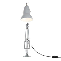 White industrial lamp with a sleek chrome base and minimalist design, perfect for modern decor.