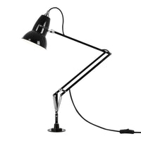 Black adjustable desk lamp with a sleek chrome finish and minimalist design. Perfect for modern decor.