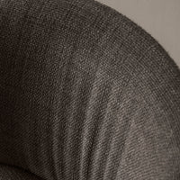 Textured gray fabric with subtle woven patterns, showcasing a modern, sophisticated design ideal for contemporary interiors.