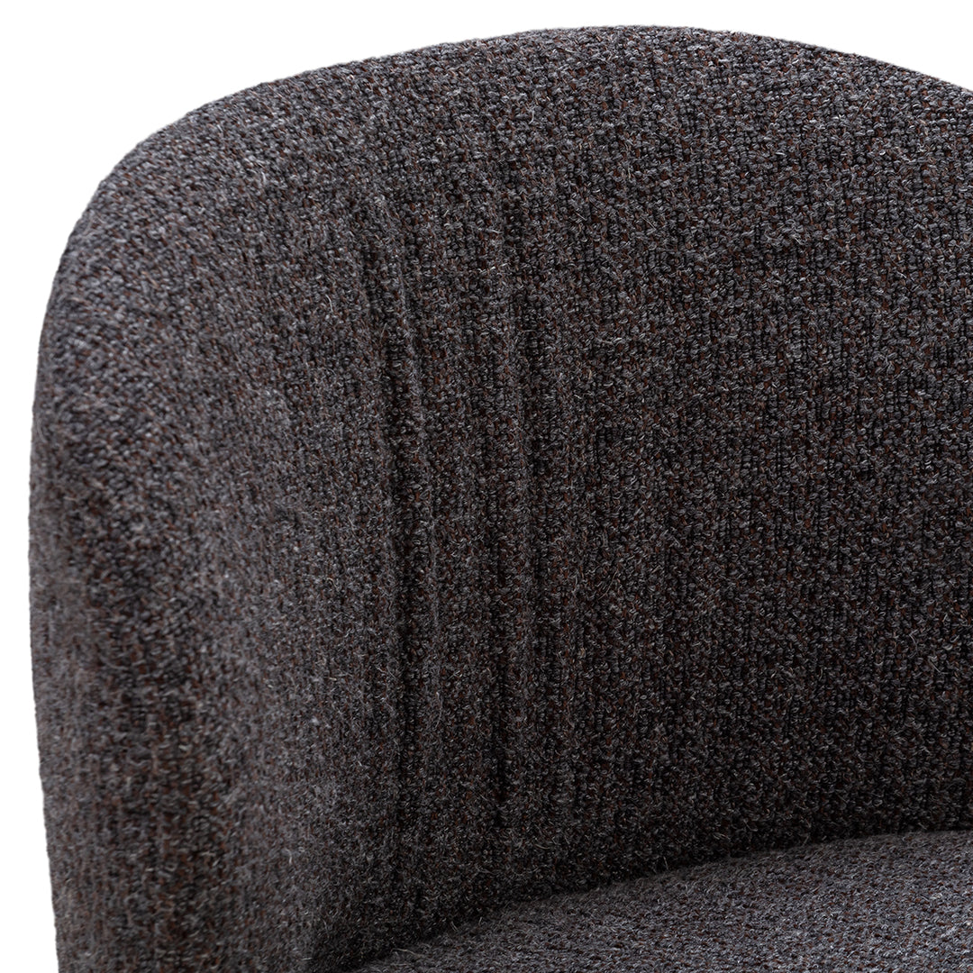 Textured gray fabric with subtle stripes, showcasing a modern, cozy look for contemporary seating.