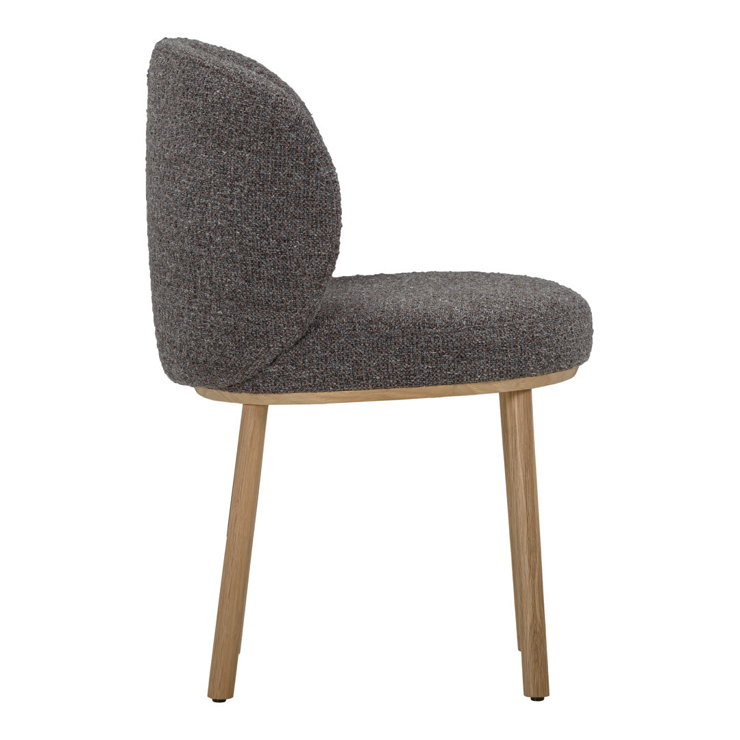 Side view of a modern chair with a textured gray fabric cushion and wooden legs, showcasing a minimalist design.