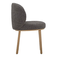 Side view of a modern chair with a textured gray fabric cushion and wooden legs, showcasing a minimalist design.