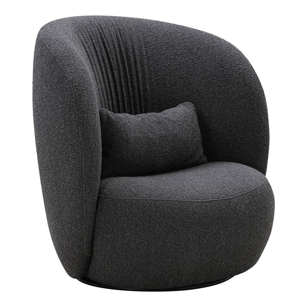 Modern gray armchair with a curved shape and subtle ribbed pattern, featuring a plush accent pillow.